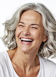 Happy older woman with beautiful teeth